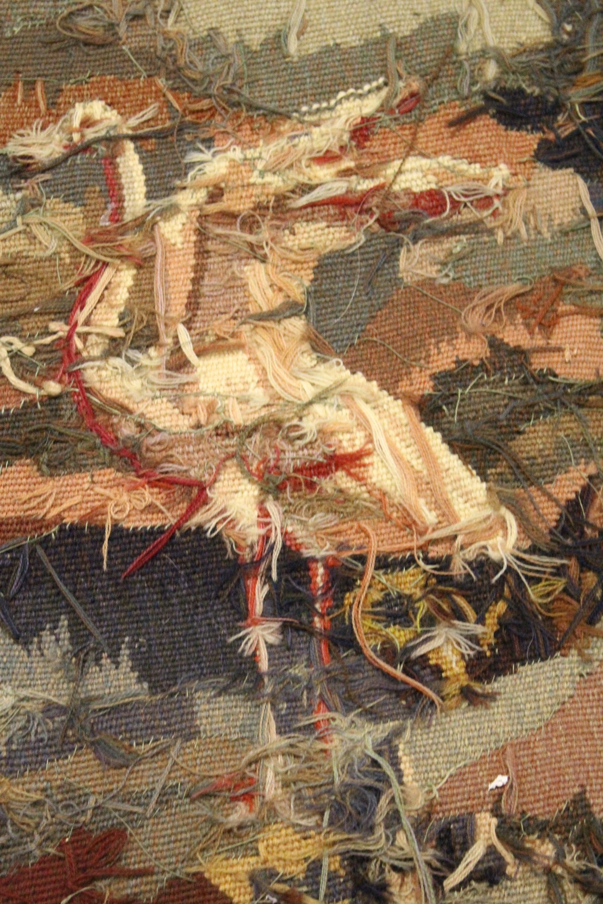 A CONTINENTAL TAPESTRY WALL HANGING with a wooded river landscape, classical ruins and birds. 5ft - Image 5 of 6
