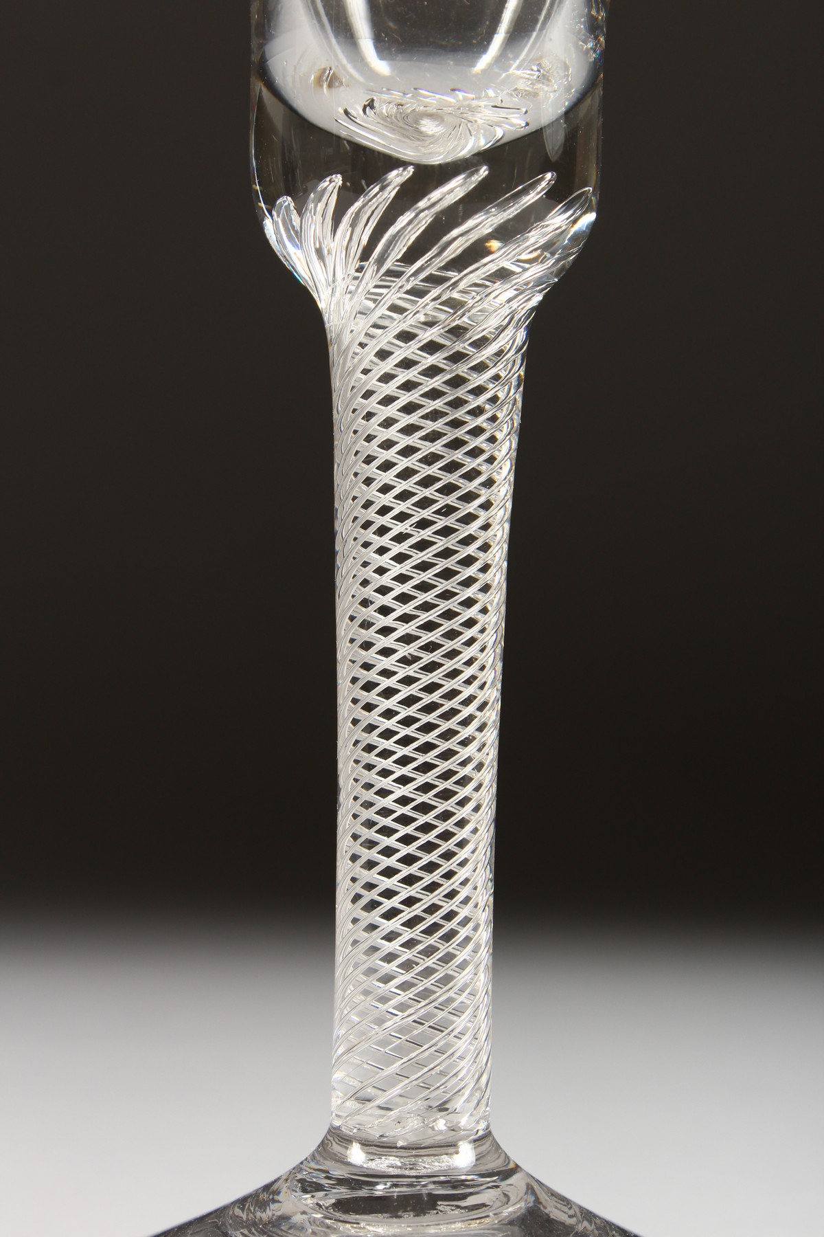 A GEORGIAN WINE GLASS with inverted bell shaped bowl and air twist stem. 6.5ins high. - Image 2 of 4