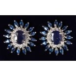 A GOOD PAIR OF SILVER AND SAPPHIRE CLUSTER EARRINGS.