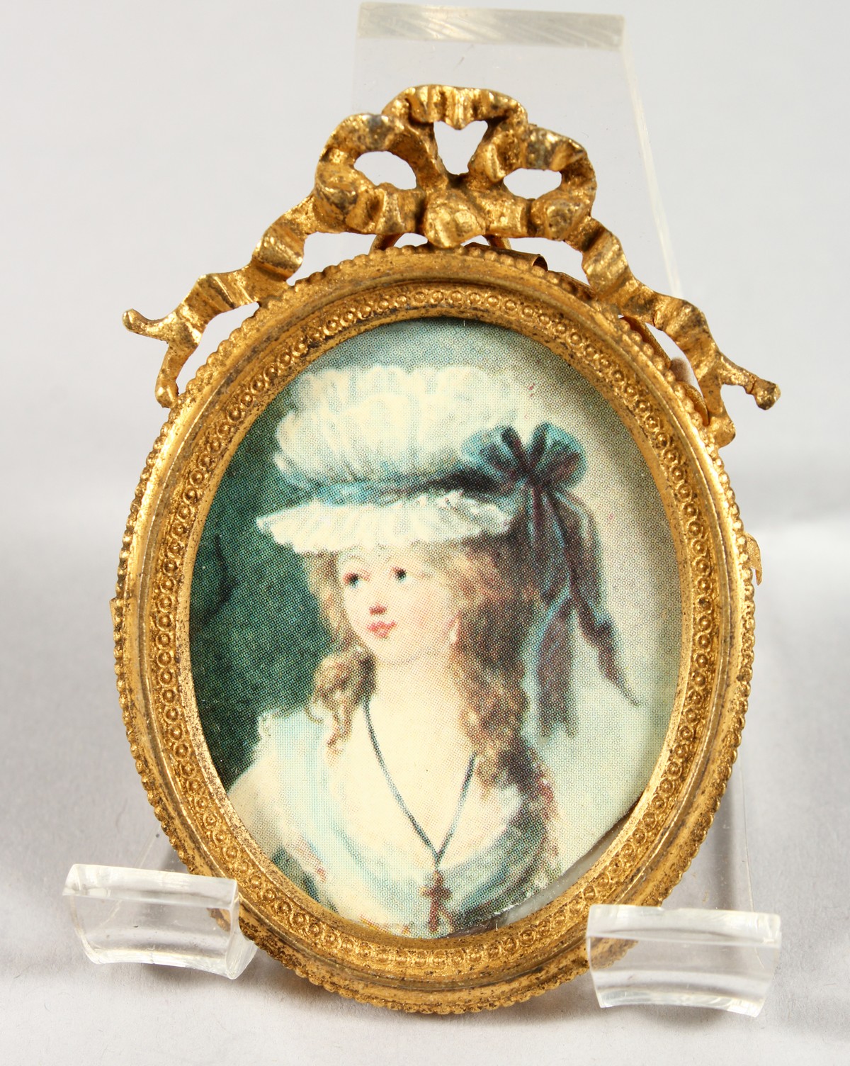 EARLY 19TH CENTURY FRENCH SCHOOL. Portrait miniature of a young lady with long hair. 1.5ins x 1.