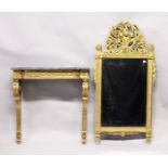 AN 18TH CENTURY ITALIAN GILTWOOD CONSOLE AND MIRROR, the mirror with pierced frieze basket and