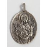 A RUSSIAN SILVER OVAL SHAPED ICON PENDANT. 2ins long.