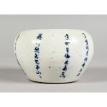 A SMALL CHINESE PORCELAIN BRUSH POT, decorated with calligraphy. 3.5ins diameter.