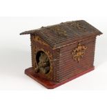 A VERY GOOD BLACK FOREST CARVED WOOD DOG IN A KENNEL BOX, the roof opens to reveal a box, the dog