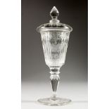 AN ENGRAVED GOBLET AND COVER. 8.5ins high.