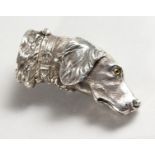 A CAST NOVELTY SILVER HOUND'S HEAD VESTA.