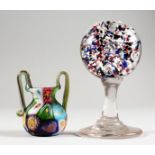 A MINIATURE MILLEFIORI GLASS VASE AND A SMALL WIG STAND (2).