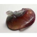 A GOOD CARVED AGATE LIZARD DESK WEIGHT. 4ins long.