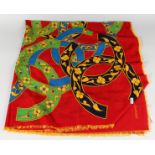 A VINTAGE CHANEL SILK SCARF, RED AND BLUE WITH FLOWER HEADS.
