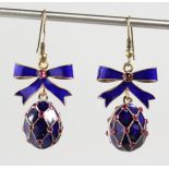 A PAIR OF RUSSIAN SILVER AND ENAMEL EGG AND BOW pendant earrings.