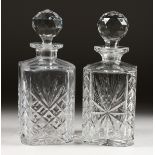 TWO CUT GLASS WHISKY DECANTERS. 10ins high.