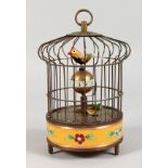 A SMALL BIRDCAGE AUTOMATON CLOCK. 8ins high.