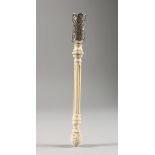 A 19TH CENTURY FRENCH IVORY AND SILVER FILIGREE POSY HOLDER. 8ins high.