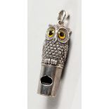 A NOVELTY SILVER OWL WHISTLE.