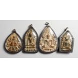 FOUR MINIATURE ASIAN ICONS. 2.5ins - 3ins high.