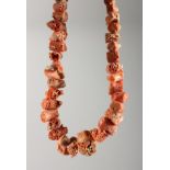 A CORAL NECKLACE.