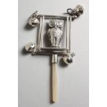 A LARGE SILVER OWL BABY'S RATTLE with four bells.