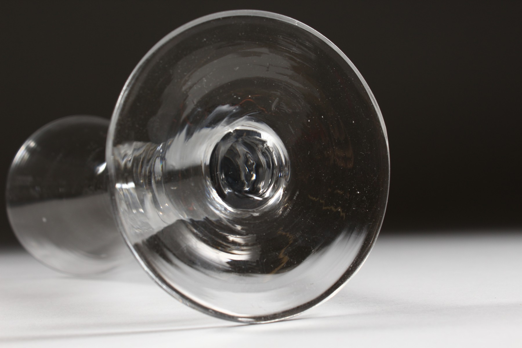 A LARGE PLAIN GEORGIAN WINE GLASS with long tapering bowl. - Image 4 of 4