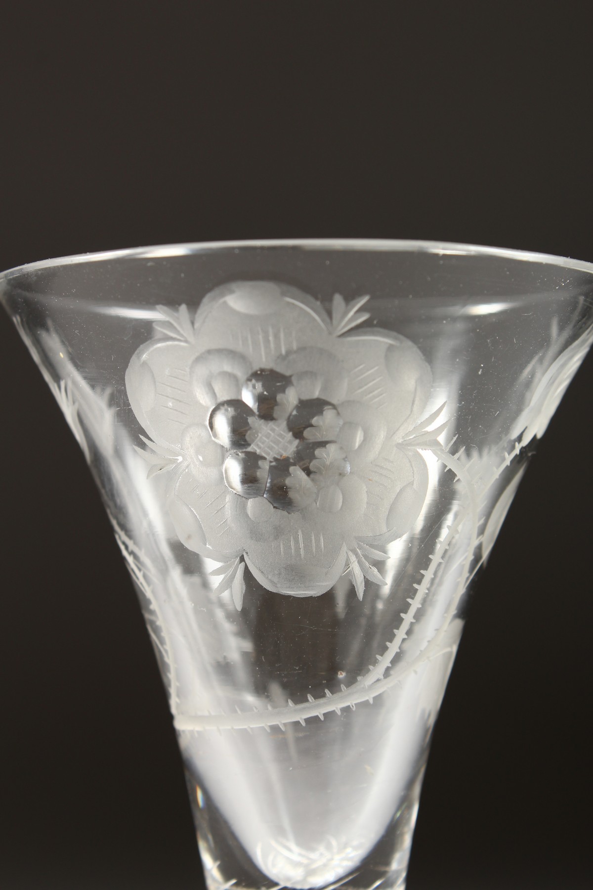 A VERY GOOD JACOBITE WINE GLASS, the trumpet bowl engraved with a rose and leaves, with an air twist - Image 3 of 5