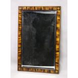 A REGENCY DESIGN RECTANGULAR MIRROR, with specimen wood sectional frame, the corners with an