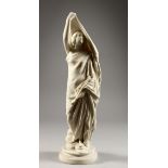 A PARIAN PORCELAIN FIGURE OF A CLASSICAL LADY on a circular base. 16ins high.