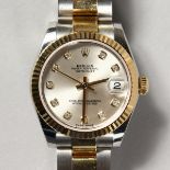 A LADIES' ROLEX STEEL AND GOLD OYSTER PERPETUAL WRISTWATCH in original box.