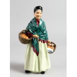 A ROYAL DOULTON FIGURINE, "The Orange Lady", HN1953.