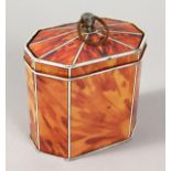 A GEORGIAN STYLE FAUX TORTOISESHELL TIN TEA CADDY. 4ins high.