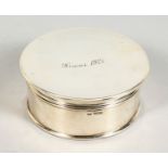 A CIRCULAR SILVER JEWELLERY BOX AND COVER with blue velvet interior. 4ins diameter. Inscribed Xmas