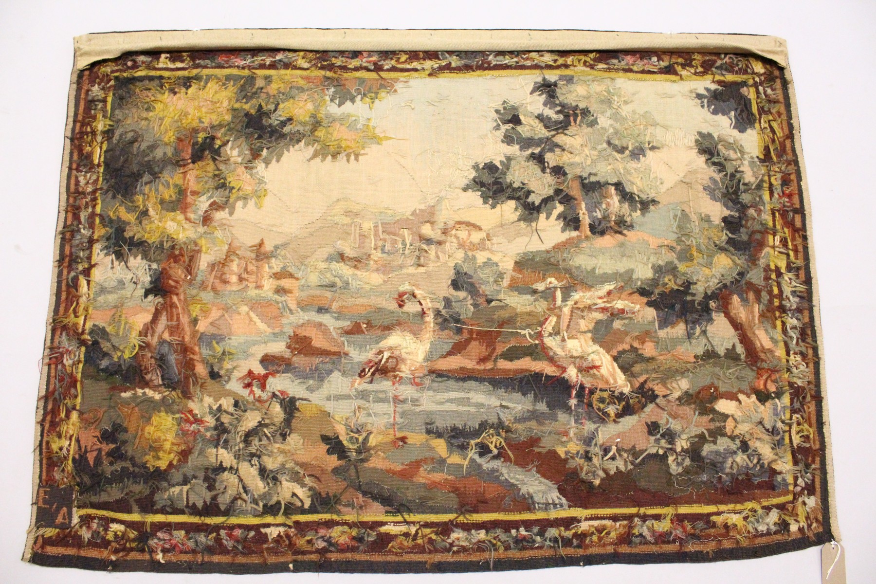 A CONTINENTAL TAPESTRY WALL HANGING with a wooded river landscape, classical ruins and birds. 5ft - Image 3 of 6