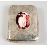 AN ENGRAVED SILVER CIGARETTE CASE, with later enamel plaque of a female nude. 3.5ins x 2.75ins.