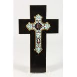 A CHAMPLEVE ENAMEL CROSS on a black marble cross. 11.5ins long.