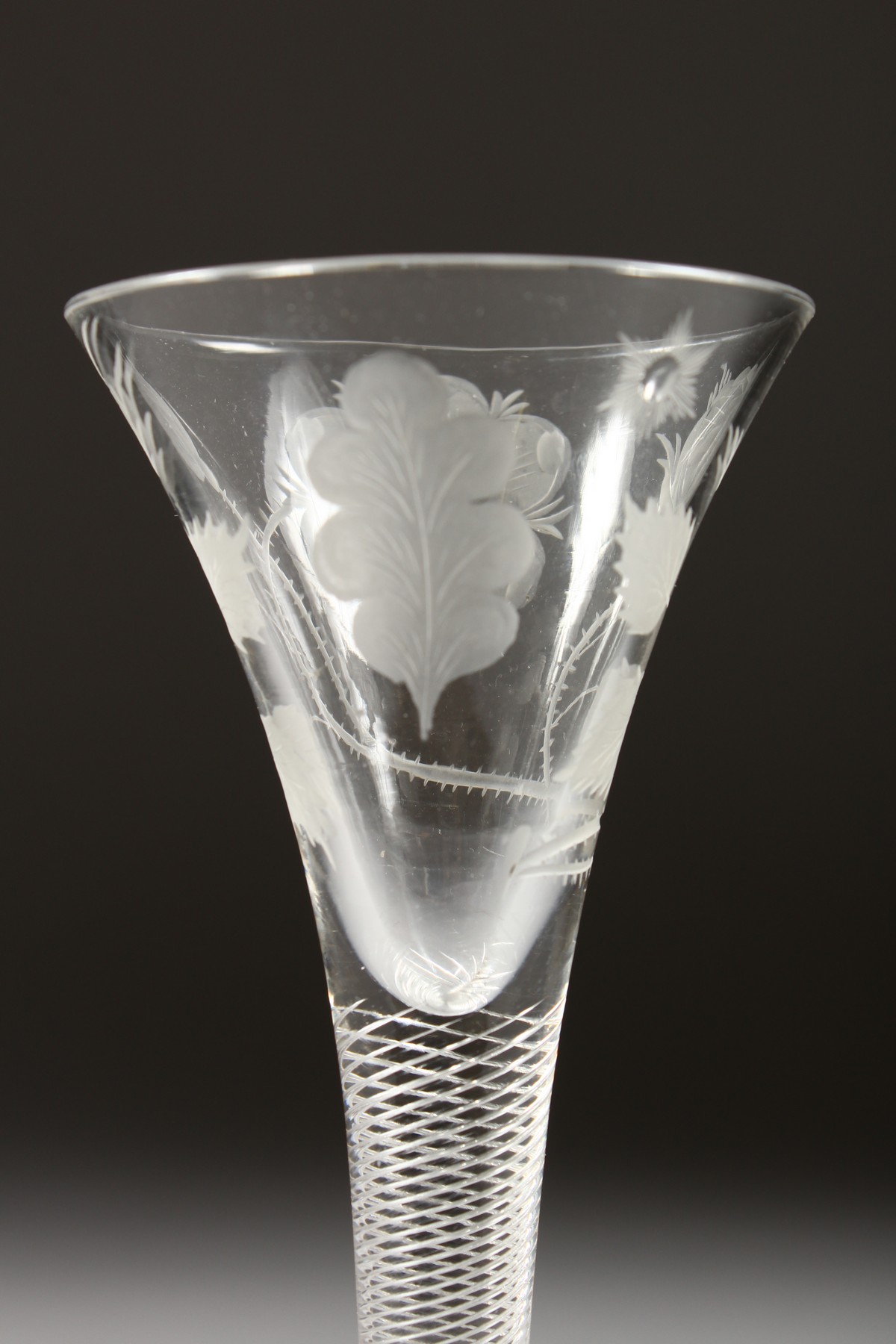 A VERY GOOD JACOBITE WINE GLASS, the trumpet bowl engraved with a rose and leaves, with an air twist - Image 4 of 5