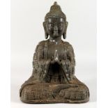 A LARGE BRONZE SEATED BUDDHA. 17ins high.