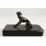 A SMALL 18TH CENTURY BRONZE OF A WHIPPET. 2.25ins wide.