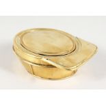 A BRASS JOCKEY CAP SNUFF BOX. 3.5ins long.