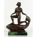 AN UNUSUAL BRONZE GROUP OF A NAKED FEMALE FIGURE RIDING ON THE BACK OF A FISH, mounted on a marble