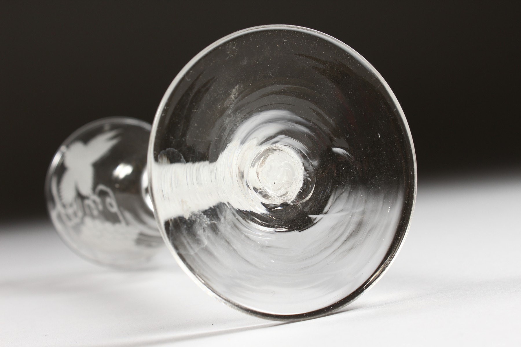 A GEORGIAN WINE GLASS, the bowl engraved with fruiting vines with white twist stem. 5.25ins high. - Image 7 of 7