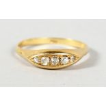 A 9CT GOLD THREE STONE DIAMOND RING.