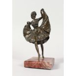 A SMALL AUSTRIAN BRONZE GIRL in a flapper dress, on a square marble base. 6ins high.
