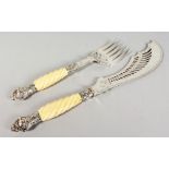 A PAIR OF PLATED FISH SERVERS, with silver mounted ivory handles. 11ins and 15ins long.