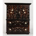 A SUPERB ANGLO INDIAN ROSEWOOD AND IVORY INLAID APPRENTICE'S CABINET with two panel doors opening to