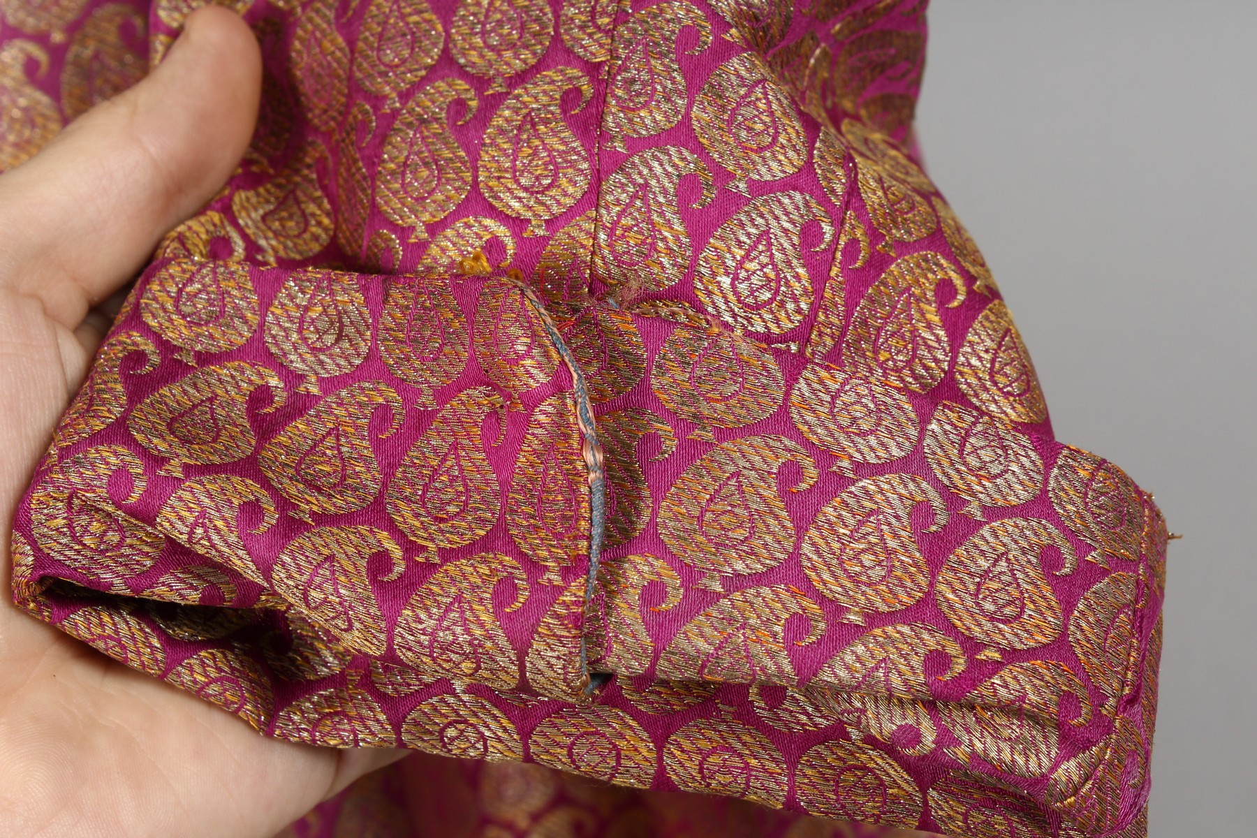 A GOOD INDIAN HOUSECOAT, purple ground with allover gilt thread Boteh design. 3ft 4ins. - Image 9 of 11