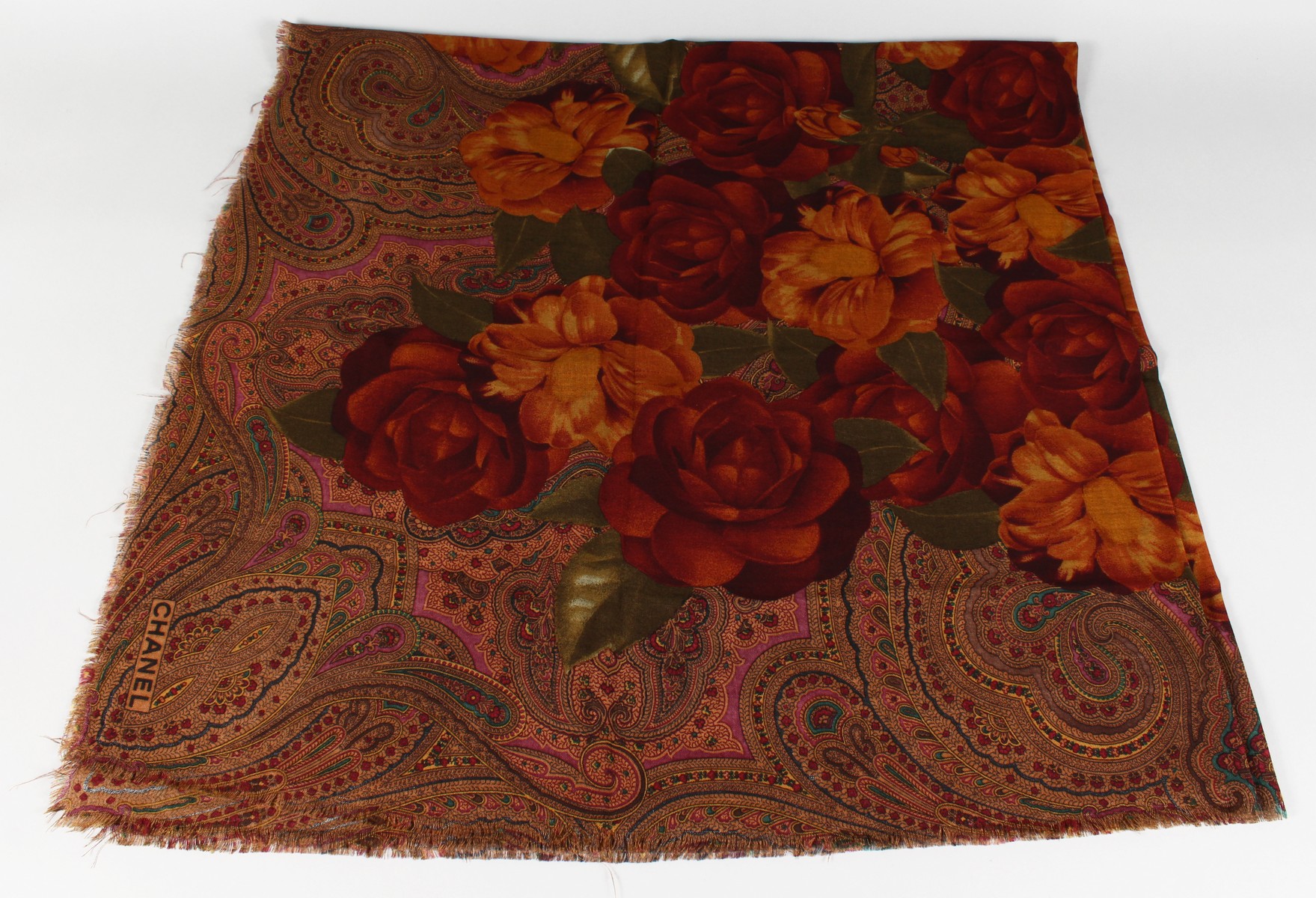 A VINTAGE CHANEL SILK SCARF, RED PAISLEY DESIGN WITH ROSES.