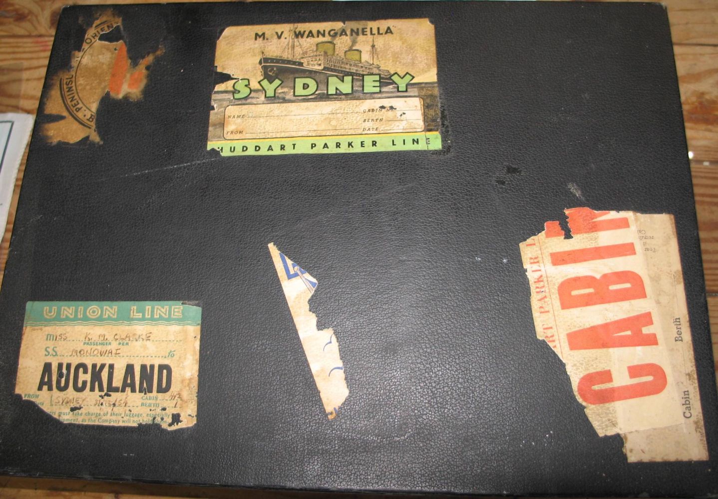 WEST AFRICA. Small suitcase, with vintage luggage labels, containing photographs, ephemera and