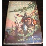 JOHNS (Captain W. E.) Biggles in Borneo, Oxford University Press, 1st Edition, d/w, 1943.