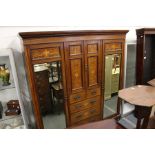 A late Victorian inlaid rosewood compactum.