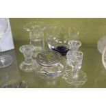 A glass bowl, candle holders etc.