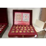 The Empire Collection, a cased set of twenty five silver gilt Royal commemorative ingots.