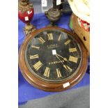 A 19th century oak circular wall clock.